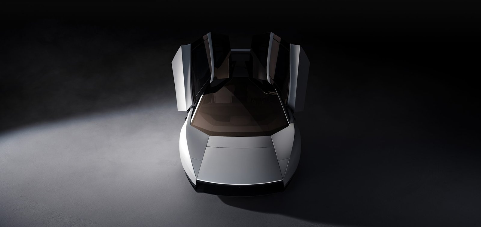 Front view of the Tesla Roadster with its doors raised