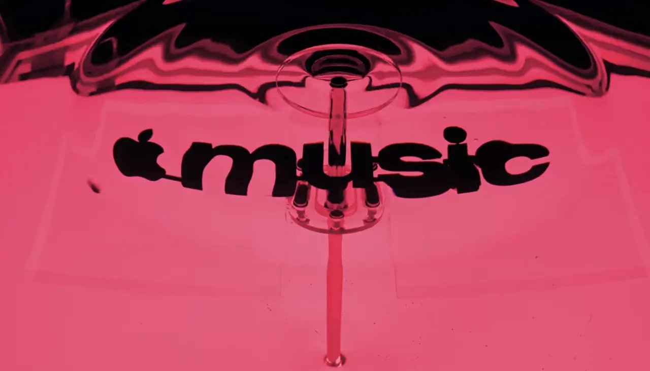 Apple Music Rebrand: The Logo Made by Sound 2 The Apple Music wordmark distorted by ripples in pink-lit oil around a transducer